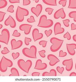 Seamless pattern with pink hearts on a light pink background. Valentine's day background.