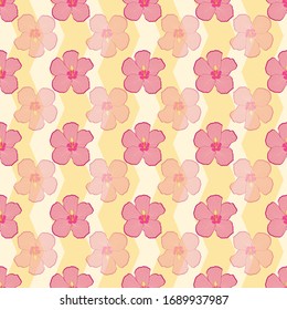 Seamless pattern with pink hibiscus on yellow chevron background