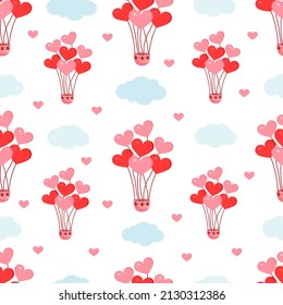 Seamless pattern with pink hot air balloons in the shape of hearts in the sky between the clouds. Vector texture illustration for postcard, textile, decor, paper, texture, wrapping.