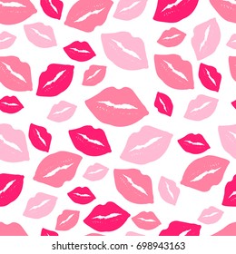 Seamless pattern with pink kisses on white background. Can be used for design of wrapping paper; textile; blog decoration; banner; poster; or romantic greeting card.Vector illustration.
