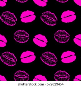Seamless pattern with pink lips imprints isolated on black background.