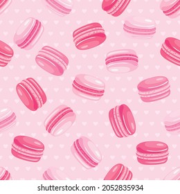 Seamless pattern of pink macaroon cakes on pink background. Texture for fabric, wrapping, wallpaper. Decorative print.