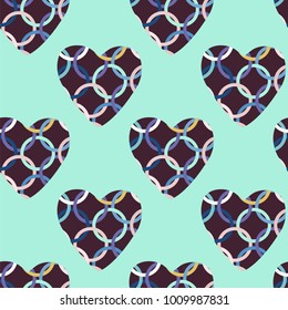 Seamless pattern with pink and red hearts. Decorative vector illustration.