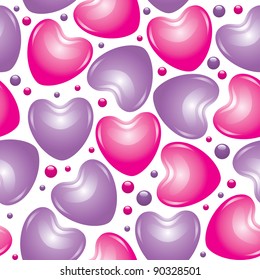 seamless pattern with pink and violet glossy hearts