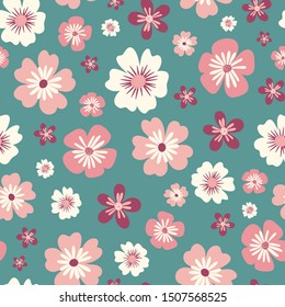 Seamless pattern of pink and white flowers on a green background.