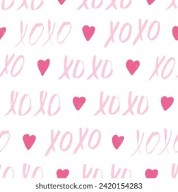 Seamless pattern with pink XOXO phrases and hearts. Romantic theme. Valentine's Day background. Vector illustration.