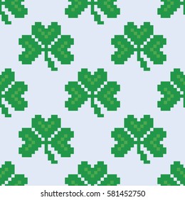 Seamless pattern with pixel clover. 8-bit pixel art backdrop. Saint Patrick's Day background. Vector illustration.