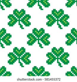 Seamless pattern with pixel clover. 8-bit pixel art backdrop. Saint Patrick's Day background. Vector illustration.