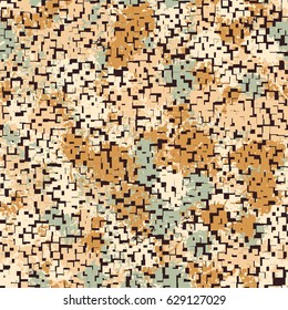 Seamless pattern. The pixel pattern in the foreground. Colorful blots in the background. Fashionable camouflage. Yellow-brown tones, green-gray.
