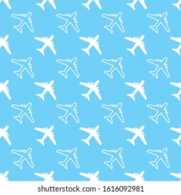 Seamless pattern with plane silhouettes on blue background