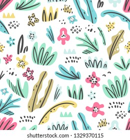 Seamless pattern with plants and flowers. Perfect for kids fabric, textile, nursery wallpaper. Cute background.
