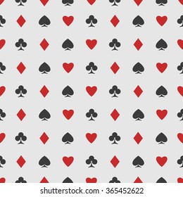 seamless pattern of playing card suits on white. vector background design. hearts, spades, diamonds and clubs symbol. casino and poker rooms wallpaper