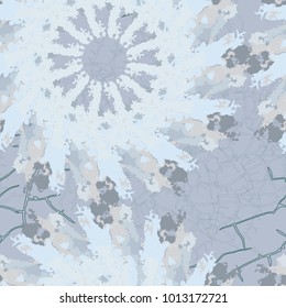 Seamless pattern with pointed snowflakes on light blue background. Can be used as Christmas or seasonal winter backdrop for computer or site or print for wrapping paper