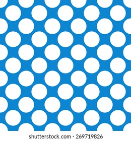 Seamless pattern polka dot style thick large circles on a monophonic background of indigo blue cornflower blue and white