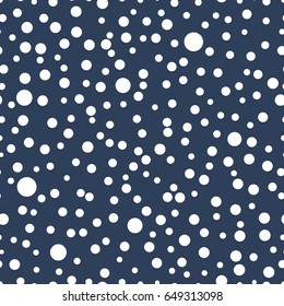 Seamless pattern with polka dots of different sizes. Dark blue and white color. Simple fashionable background for banners, printing on textile, paper, fabrics. Retro, vintage style 50s, 60s