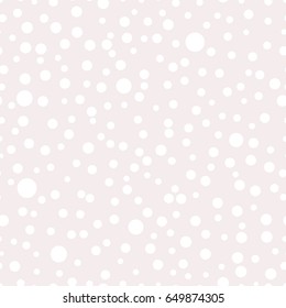 Seamless pattern with polka dots of different sizes.Pink and white color. Simple fashionable background for banners, printing on textile, paper, fabrics. Retro, vintage style 50s, 60s