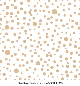 Seamless pattern with polka dots of different sizes. Beige and white color. Simple fashionable background for banners, printing on textile, paper, fabrics. Retro, vintage style 50s, 60s