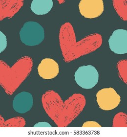 Seamless pattern with polka dots and hearts.
