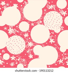 Seamless pattern with polka dots on a red background.