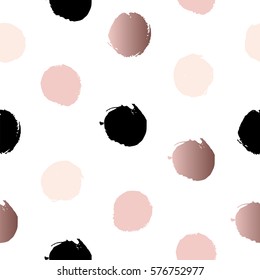 Seamless pattern with polka dots of rose gold, pink and black. Vector illustration
