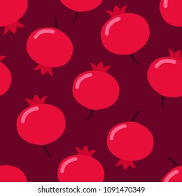 Seamless pattern with pomegranate on burgundy background. Vector illustration