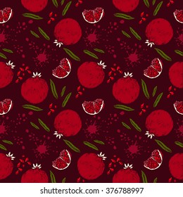 seamless pattern with pomegranate, part of pomegranate seeds and leaves of pomegranate with splashes of juice in retro style