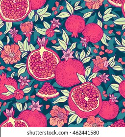 Seamless pattern with pomegranates. Decorative patterns of the pomegranate fruit on dark blue background . Fruits background. Texture with floral elements. The elegant the template for fashion prints.