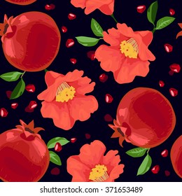  Seamless pattern with pomegranates and flowers on dark background