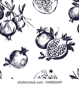 Seamless pattern with pomegranates.  Fruit on white background. 