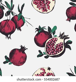 Seamless pattern with pomegranates. Fruits on white background. 