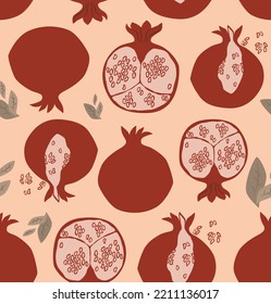 Seamless pattern of pomegranates in vector. Decorative patterns with halved pomegranates, red seeds and green leaves on a light background. Texture with floral elements. Flat vector illustration