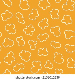 Seamless pattern with popcorn. Hand drawn pop corn with caramel for cinema. Vector illustration in doodle style on yellow background.