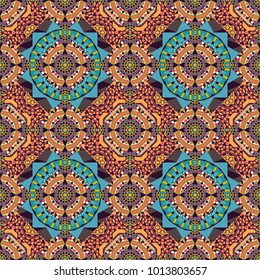 Seamless pattern with the pre-existing geometry in the drawing. Tribal ethnic arabic, indian, turkish patern ornament. Vector traditional oriental background in brown, orange and blue colors.