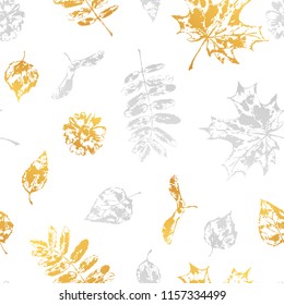 Seamless pattern with printed leaves. Art illustration of autumn foliage.