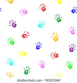 Seamless pattern with prints of children's palms 