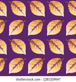 Seamless pattern of the prints of the leaves of living plants. Separate Golden leaves on purple background. Vector.