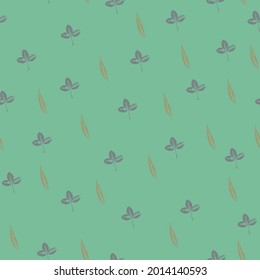 Seamless pattern with prints of leaves on a trendy green background. Grunge leaf print. Printing on fabric, wallpaper, packaging, stylized as a stamp or leaf print