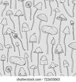 Seamless pattern with Psilocybin or hallucinogenic magic mushrooms hand drawn with contour lines on gray background. Modern vector illustration in monochrome colors for textile print, backdrop.