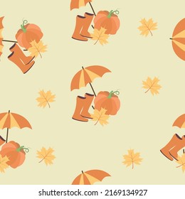 Seamless pattern with pumpkin and maple leaves, rubber boots and umbrella. Vector illustration isolated on yellow background.