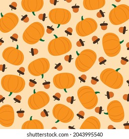 Seamless pattern pumpkins and acorns. Pumpkins and acorns background. Autumn concept.