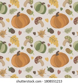 
seamless pattern with pumpkins and autumn leaves