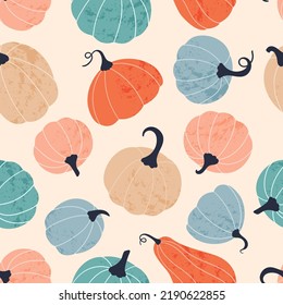 Seamless pattern with pumpkins. Autumn vector background for fabric, textile, clothing