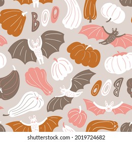 Seamless pattern with pumpkins and bats in pastel color palette. Vector Halloween texture in flat style on light grey background. Halloween pumpkin repeated background.