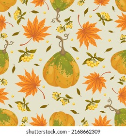 Seamless pattern with pumpkins, berries and maple leaves.Vector graphics.