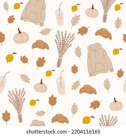 Seamless pattern with pumpkins, croissants, coffee, hoodie, lemon and autumn leaves. Perfect for wallpaper, gift paper, template filling, web page background, autumn greeting cards.Vector illustration