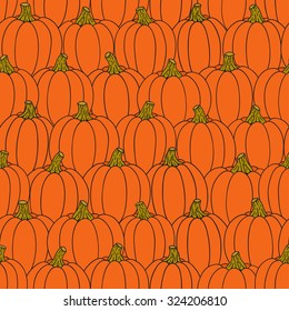 Seamless pattern with pumpkins. Halloween pattern. Thanksgiving autumn background. Can be used for wallpaper, pattern fills, web page background, postcard, poster, cover, packaging.