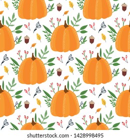 Seamless pattern with pumpkins and leaves on a white background. Vector design for wrapping paper, textile. 