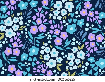 Nahtlose Muster mit violetten und blauen Blumen