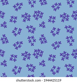 seamless pattern of purple flowers on a blue background