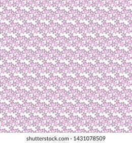 Seamless pattern with purple flowers scattered on each other. Summer vector design.
